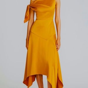 Designer Theia handkerchief elegant of shoulder dress.